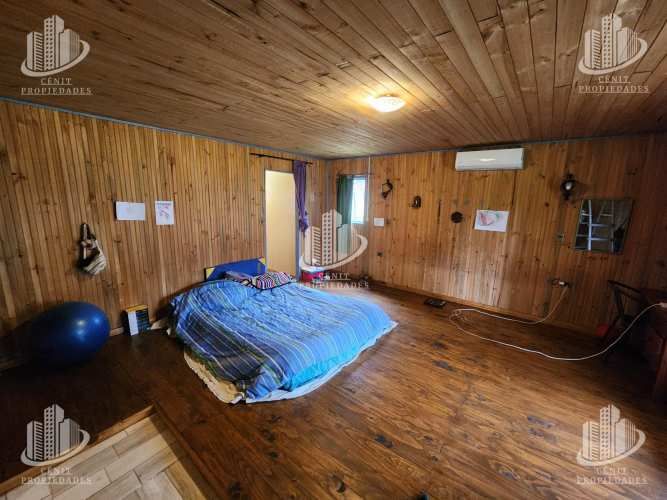 PARCELA CON CASA LONGAVÍ