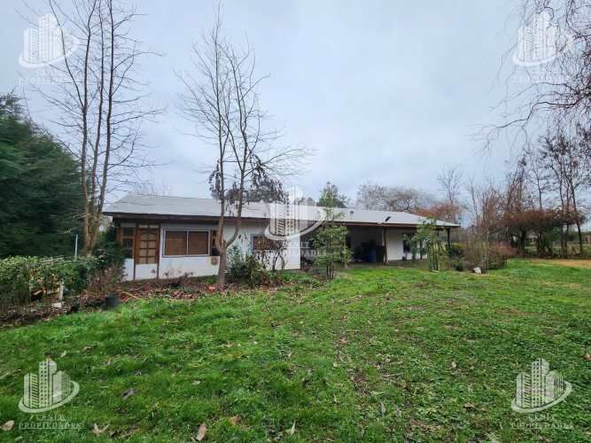 PARCELA CON CASA LONGAVÍ