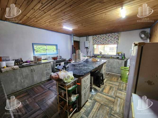 PARCELA CON CASA LONGAVÍ