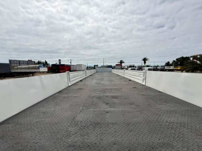 1996 Semirremolque Rampla Plana Randon 13.20 m con barandas