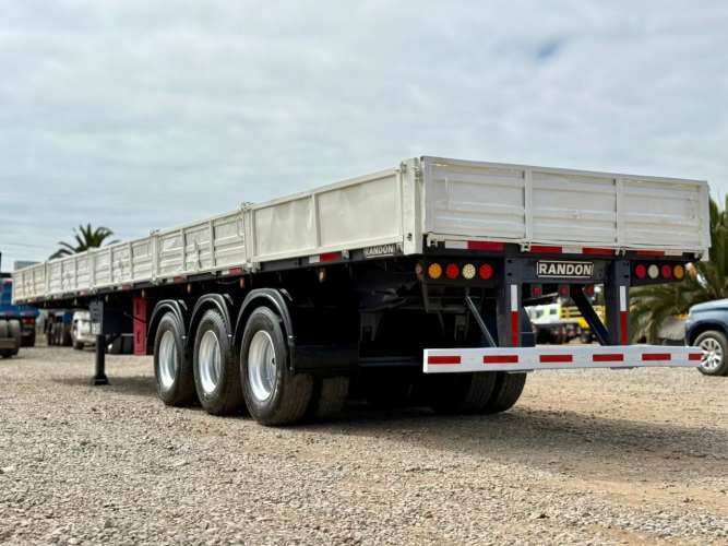 1996 Semirremolque Rampla Plana Randon 13.20 m con barandas