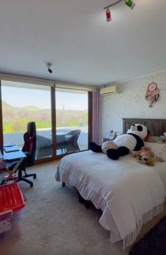 PRECIOSA CASA EN SECTOR PIEDRA ROJA  DE CHICUREO SANTIAGO