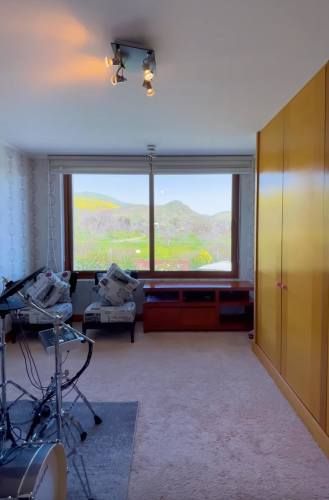 PRECIOSA CASA EN SECTOR PIEDRA ROJA  DE CHICUREO SANTIAGO