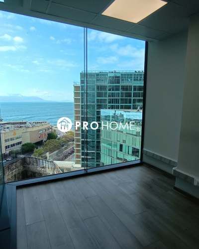 Oficina Premium en Edificio Híbrido: Parking, Vista Mar y Servicios Full