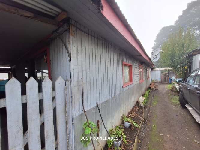 Vende Terreno 2.736 mts² con 4 casas y 4 Deptos. sector Santa Rosa