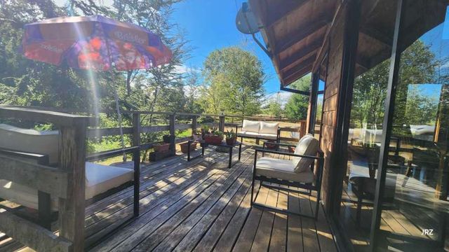 PARCELA URBANIZADA CON HERMOSA CASA PUFUDI (134286)