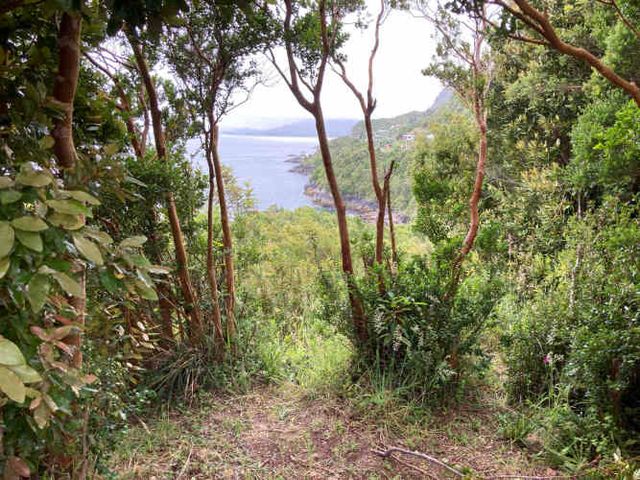 Terreno con cabañas frente al mar.