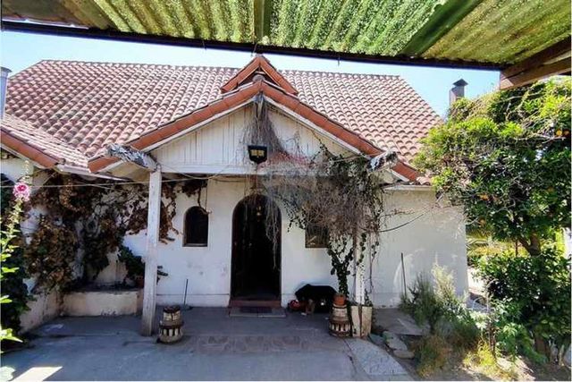 Extenso terreno con casa y potencial comercial