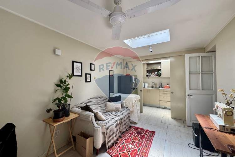 Casa de dos pisos y manzarda