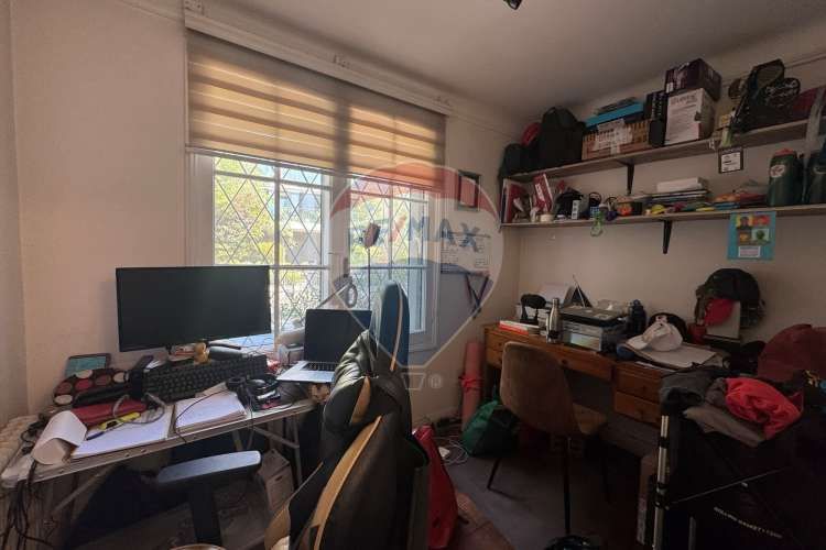 Casa de dos pisos y manzarda