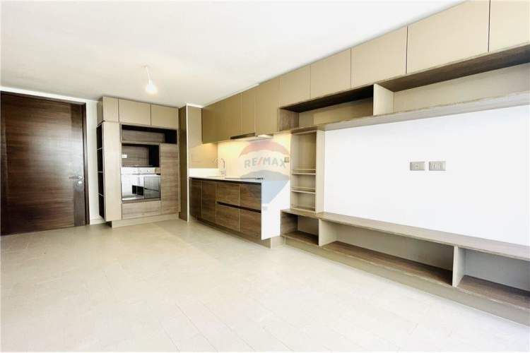 Frente al metro ñuñoa edificio imagina