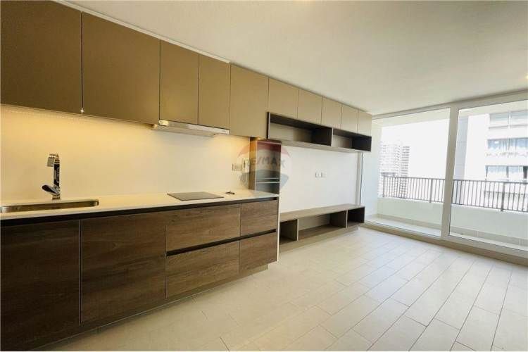 Frente al metro ñuñoa edificio imagina