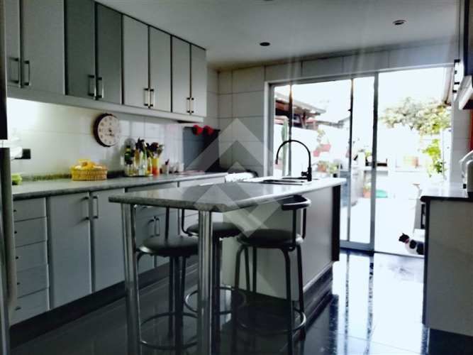 CASA Estadio Español / Neveria